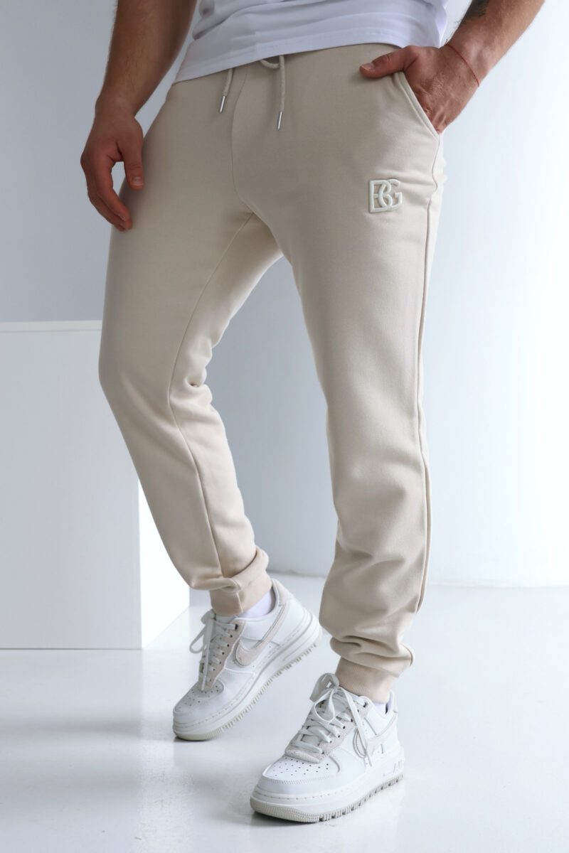 Spodnie dresowe męskie ze ściągaczem z haftowanym logo BG BRAND – jasny beż